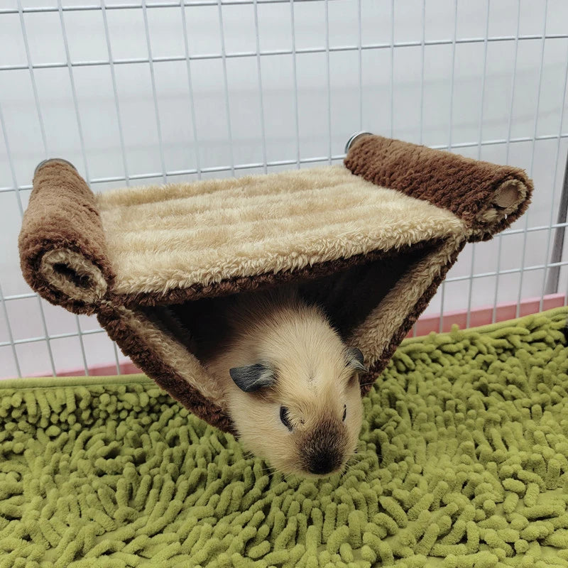 Plush hammock bed for cozy hamster and small rodent rest from Burrowly.