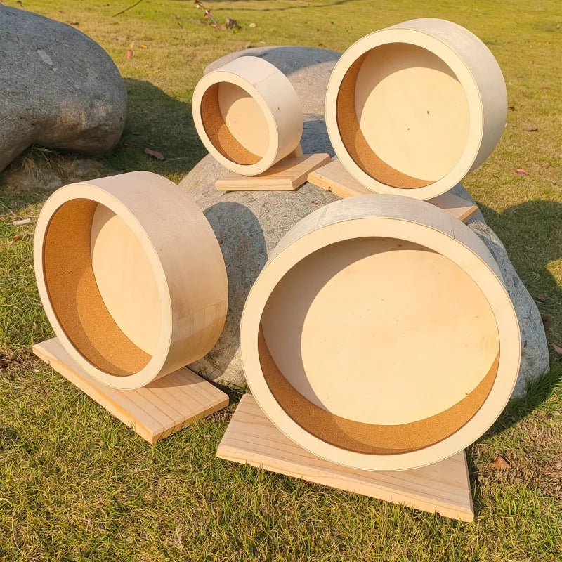 Natural Wood Silent Hamster Wheel with Stand for hamsters, gerbils, chinchillas, and hedgehogs from Burrowly small pet supplies.