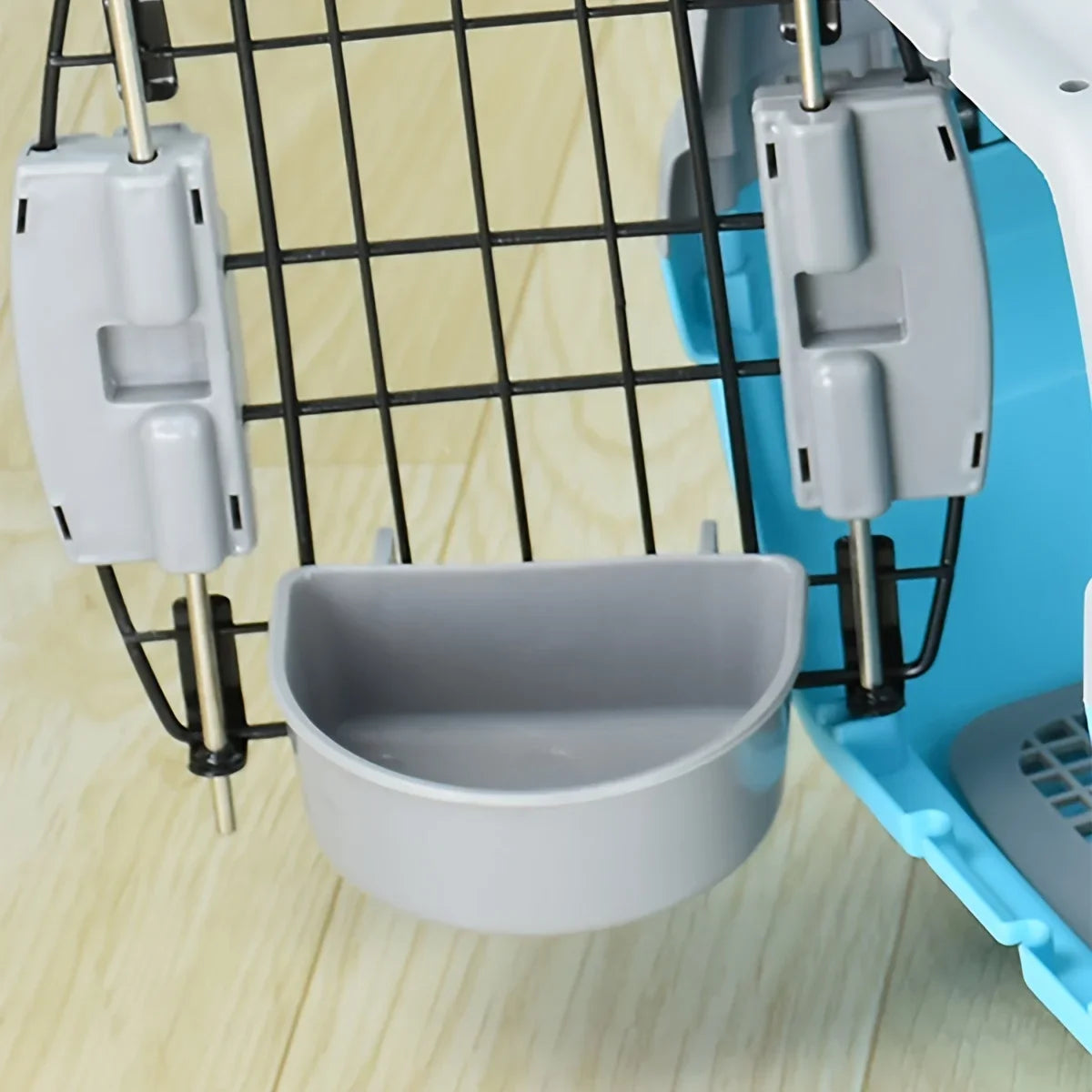 Hanging small animal food and water bowl for cage feeding from Burrowly.