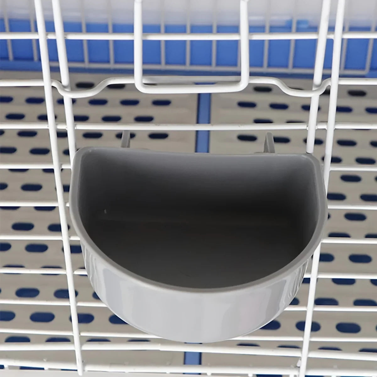 Hanging small animal food and water bowl for cage feeding from Burrowly.