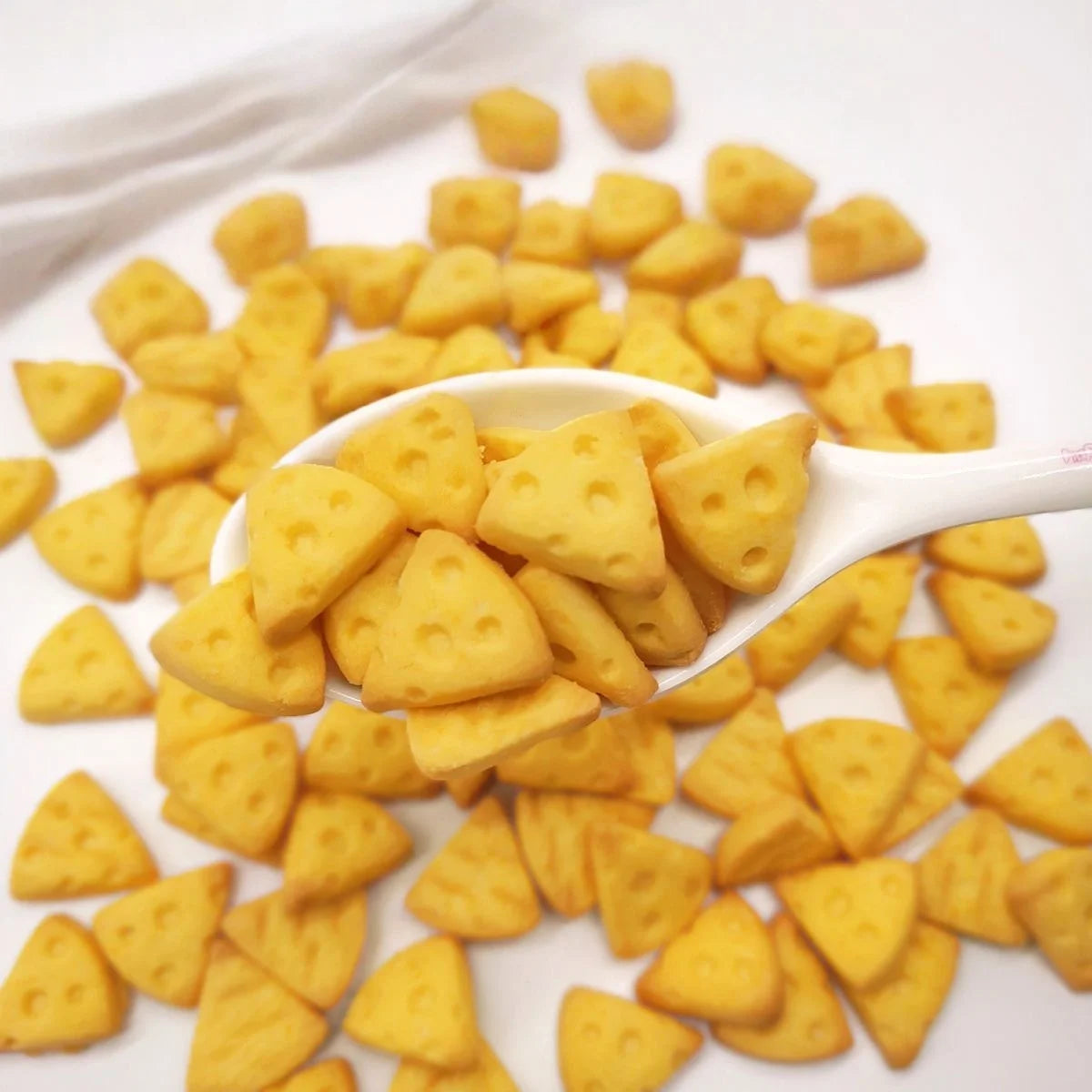 Cheese-Style Hamster Treat Biscuits for hamsters, gerbils, and mice from Burrowly small pet supplies.