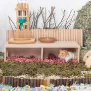 Natural wood multi-chamber hamster hideout for small pet habitats.