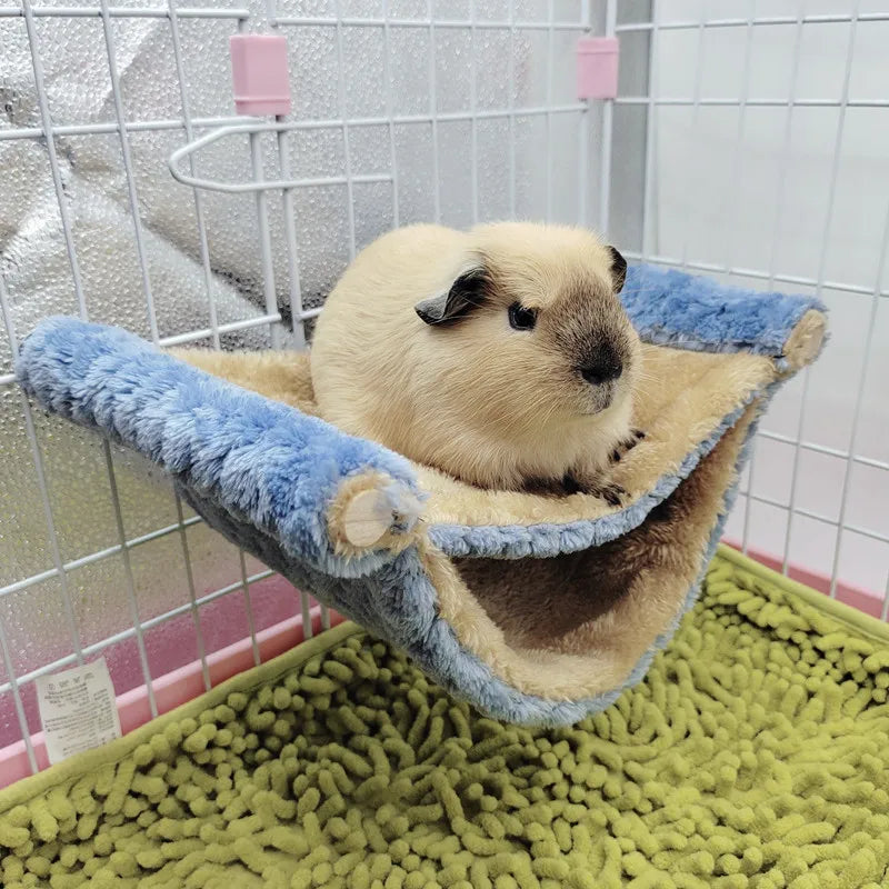 Plush hammock bed for cozy hamster and small rodent rest from Burrowly.