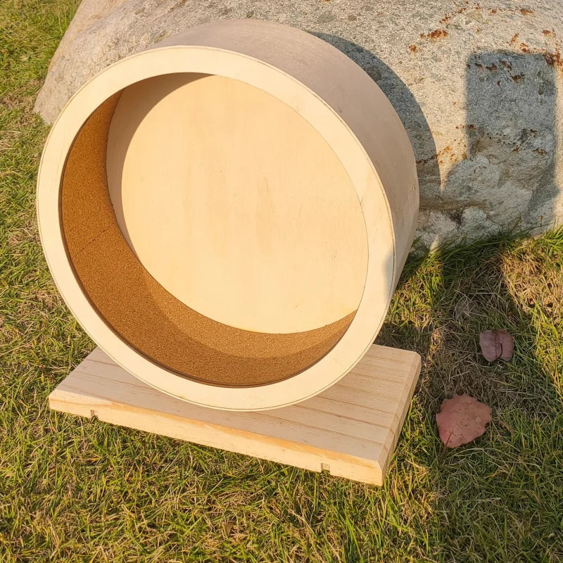 Natural Wood Silent Hamster Wheel with Stand for hamsters, gerbils, chinchillas, and hedgehogs from Burrowly small pet supplies.