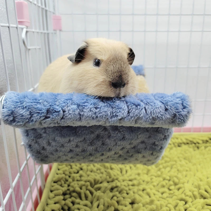 Plush hammock bed for cozy hamster and small rodent rest from Burrowly.