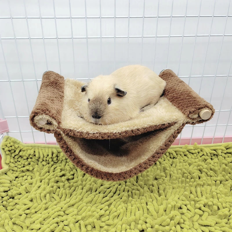 Plush hammock bed for cozy hamster and small rodent rest from Burrowly.