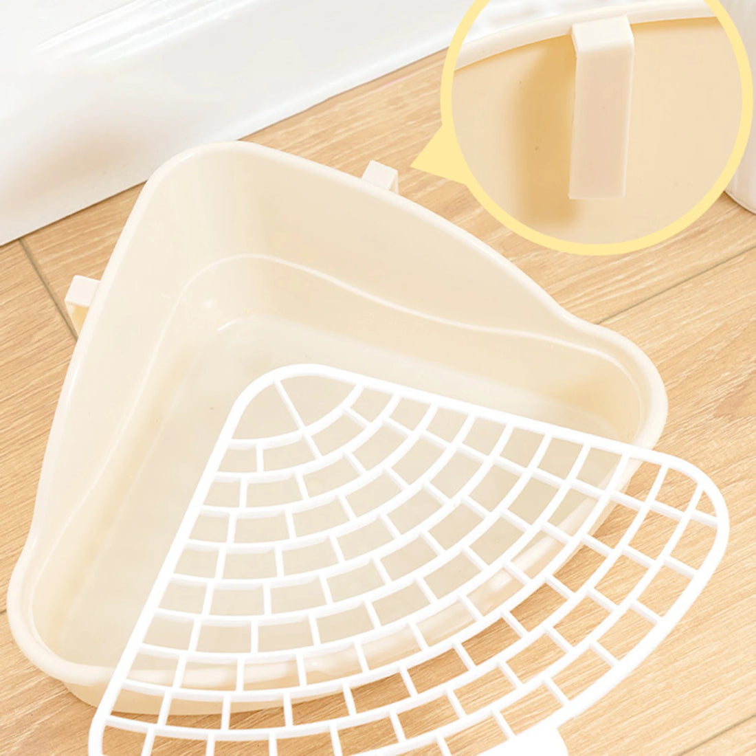 Bunny Corner Potty Trainer Tray for rabbits, ferrets, hamsters, and guinea pigs from Burrowly small pet supplies.