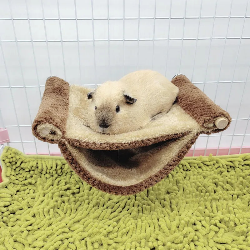 Plush hammock bed for cozy hamster and small rodent rest from Burrowly.